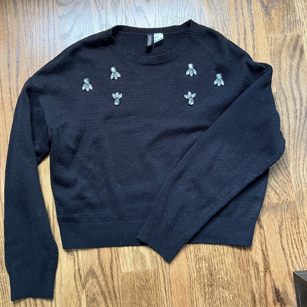 Cropped black sweater with gem details